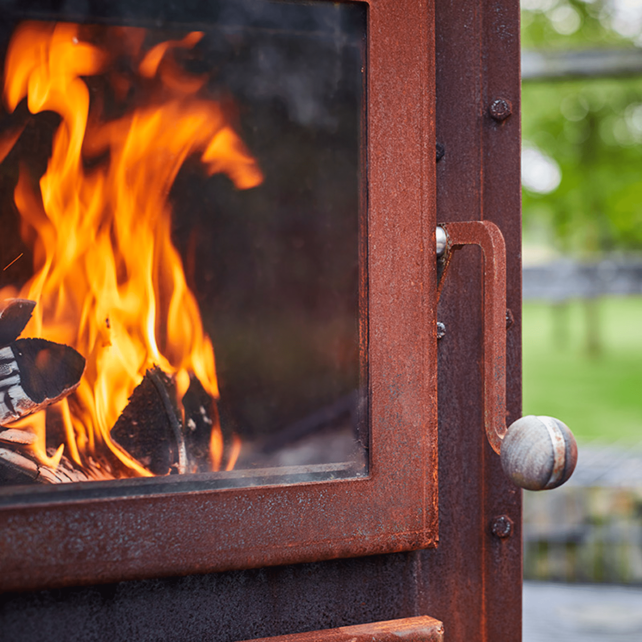 RB73 Bijuga 3mm CorTen Steel Fireplace With Two Wheels and a Push Bar - by RB73 | Buy at Agent BBQ