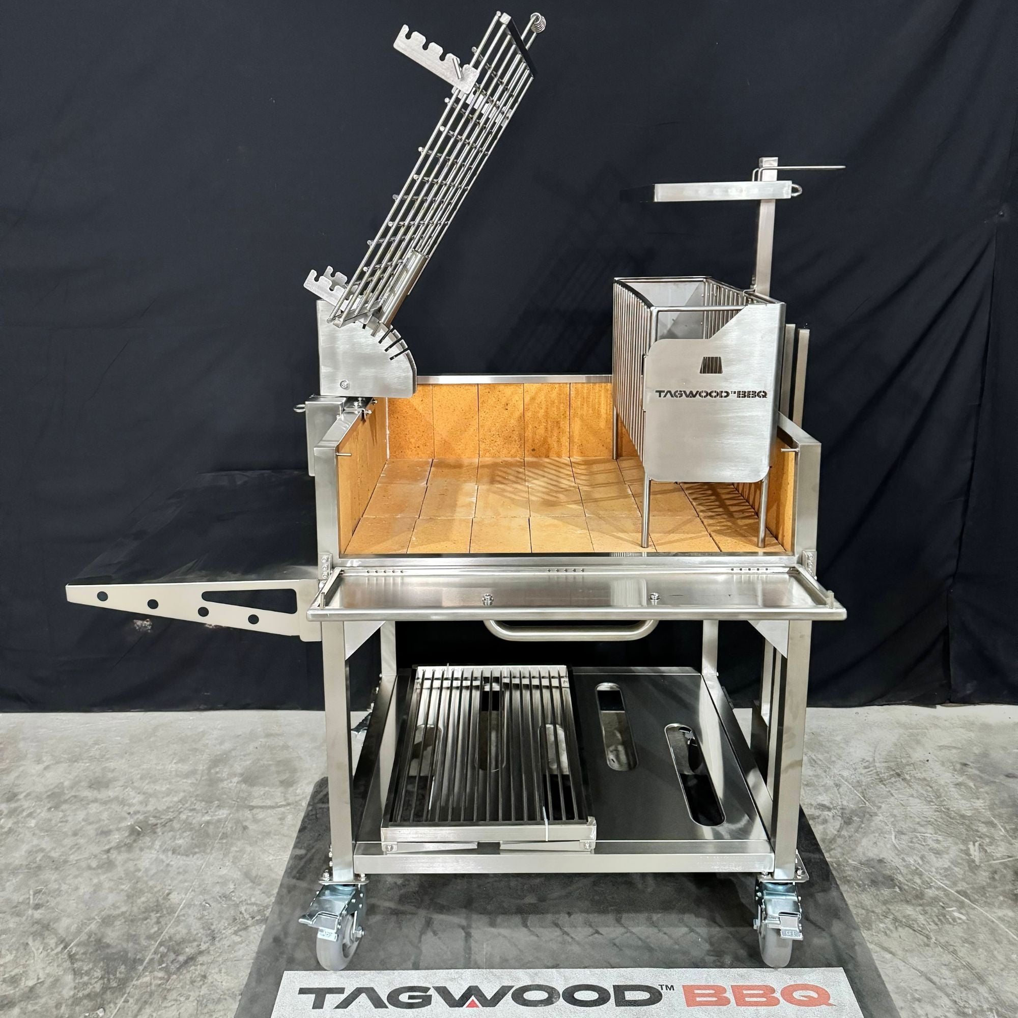 Tagwood BBQ33SS Argentine Freestanding Clamp Grill W/ Firebox - by Tagwood BBQ | Buy at Agent BBQ